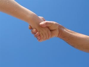 Helping hands. Found at:http://www.sxc.hu/photo/1028001